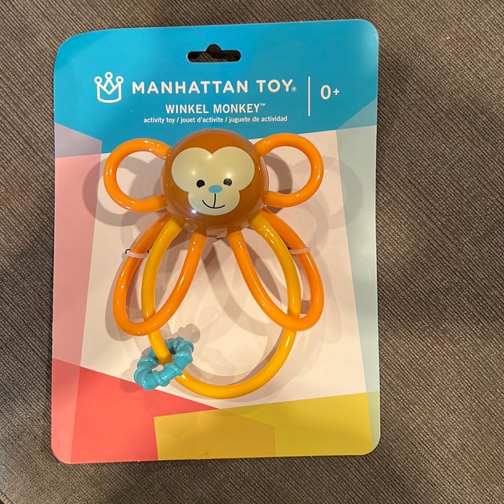 Baby monkey activity toy. Makes noise when shaken